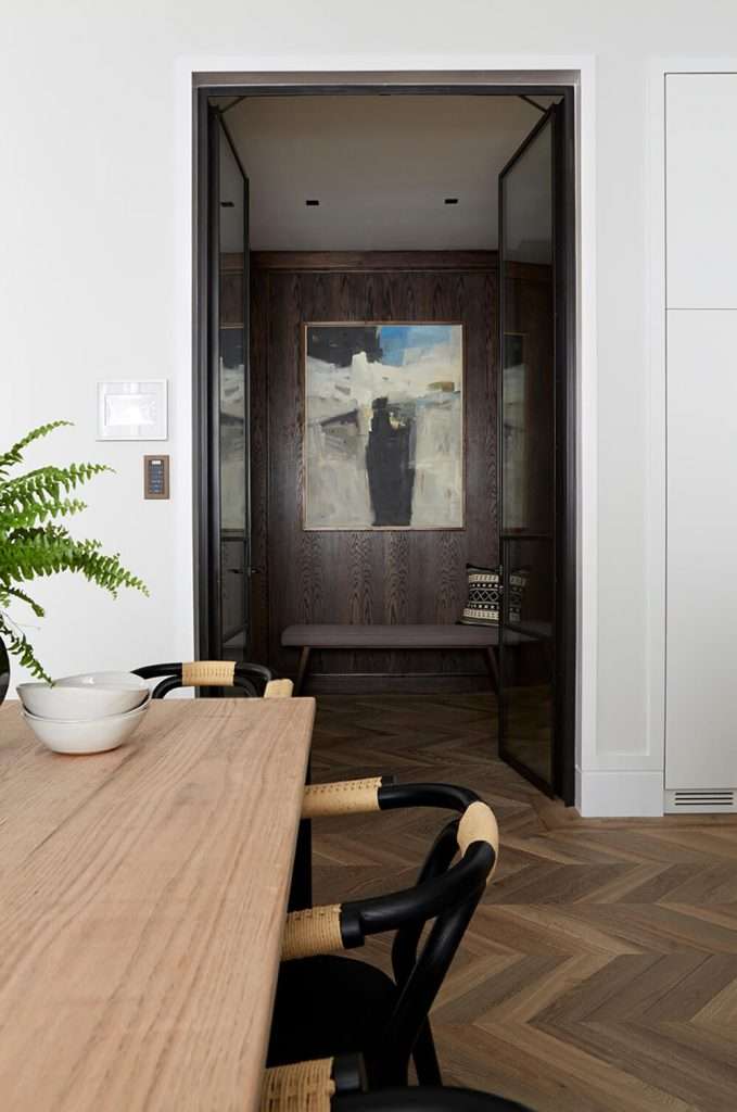 stylish black steel door in modern apartment